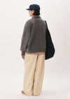 Pantalon ballon à poches plaquées