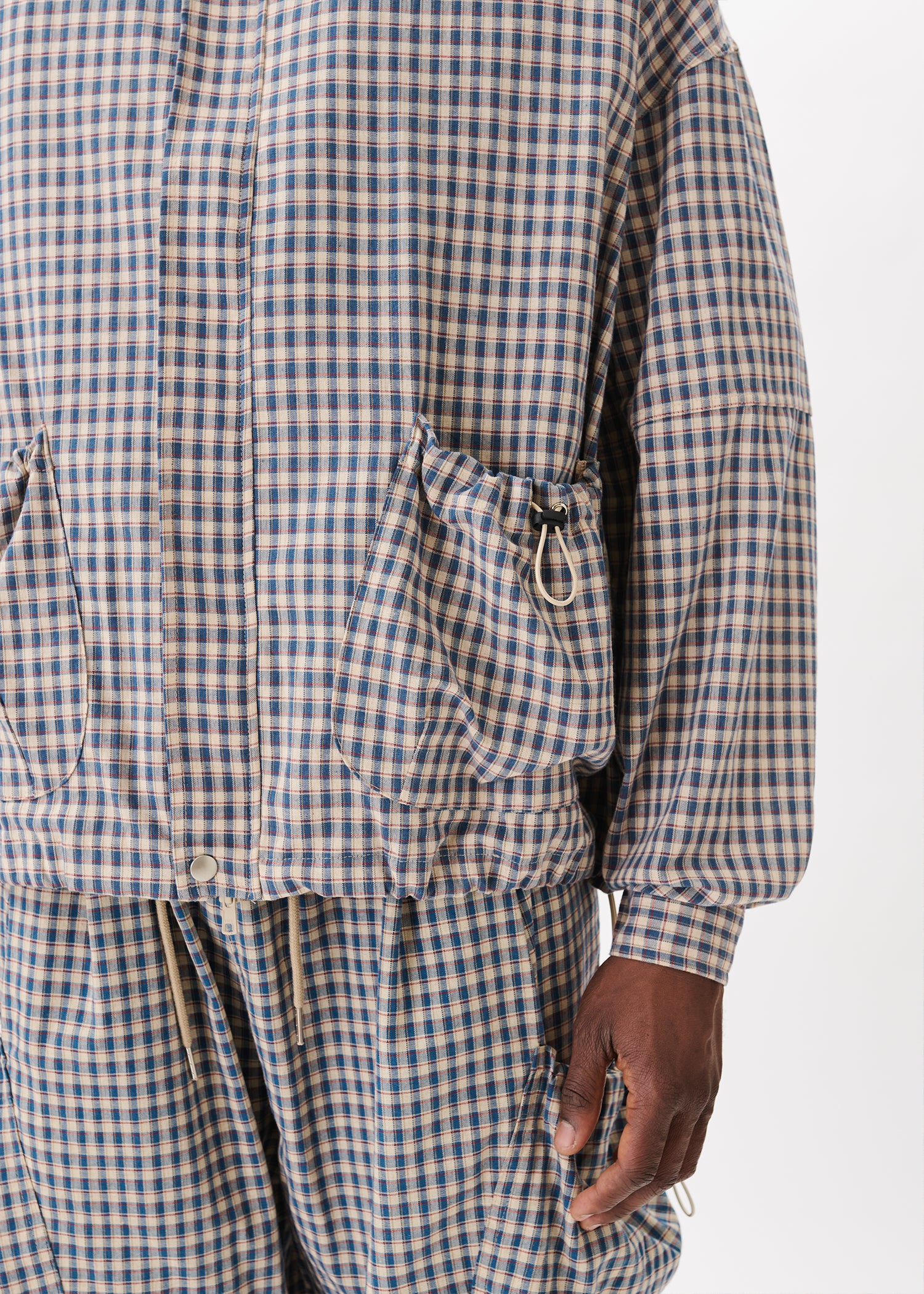 Blouson à carreaux avec cordon élastique