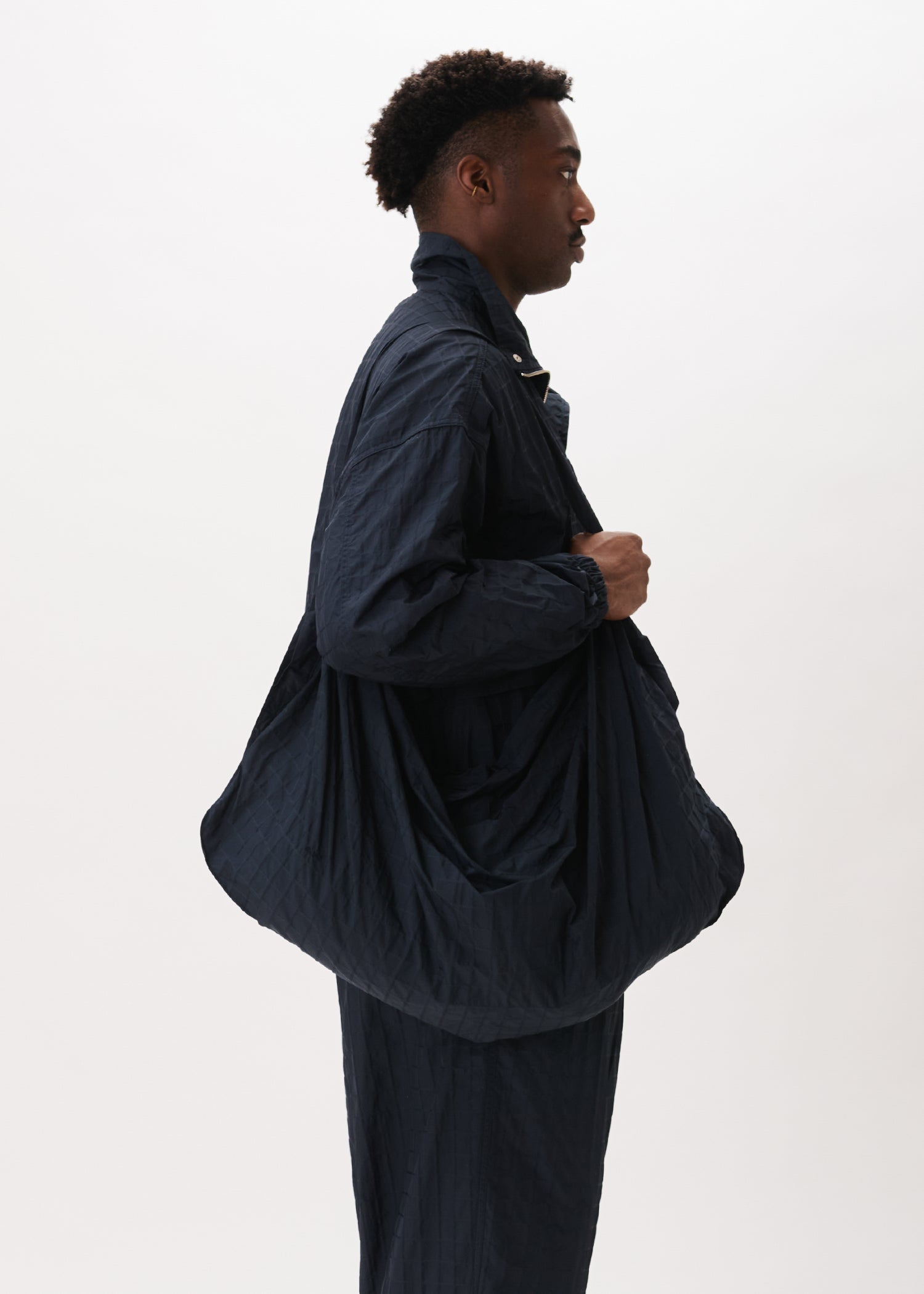 Sac à carreaux trois en un