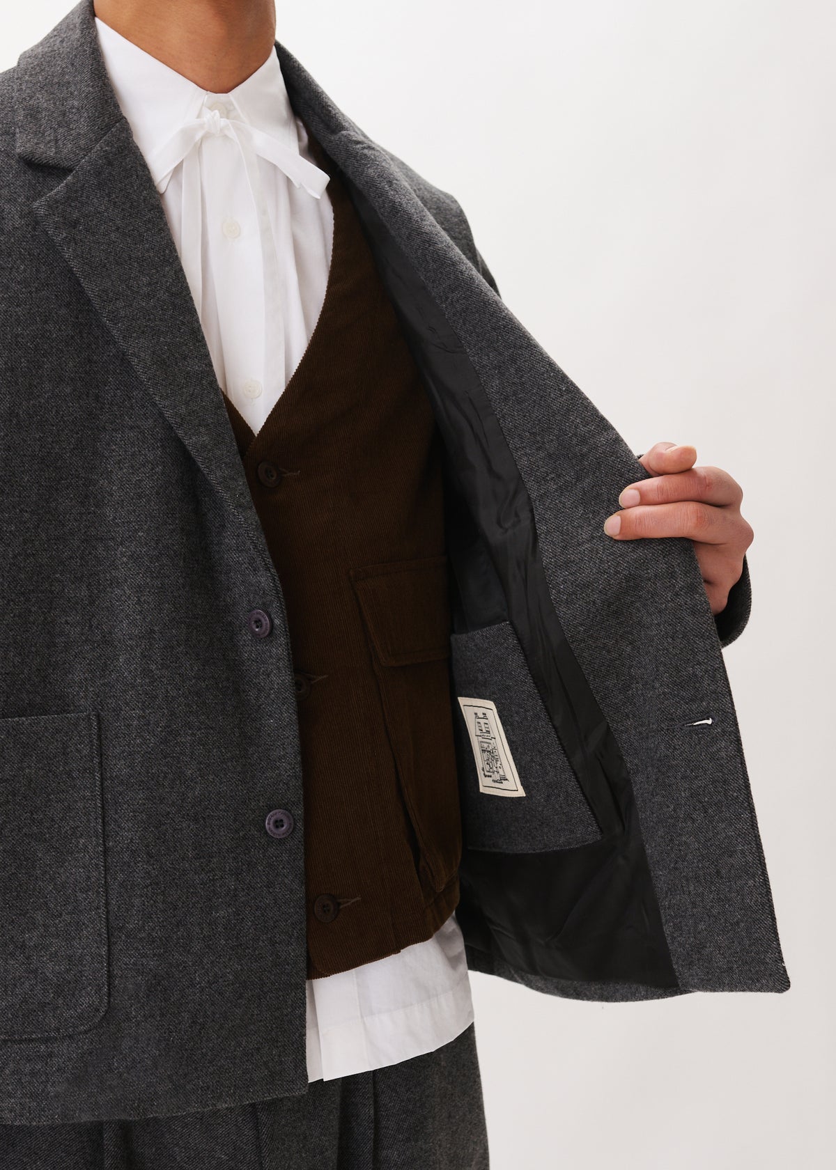 Veste de costume en laine à poches